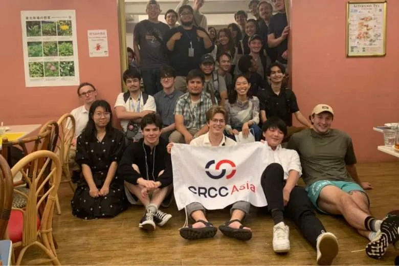 group holding CRCC Asia flag