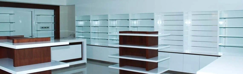 An empty pharmacy shop: retail pharmacist job description.